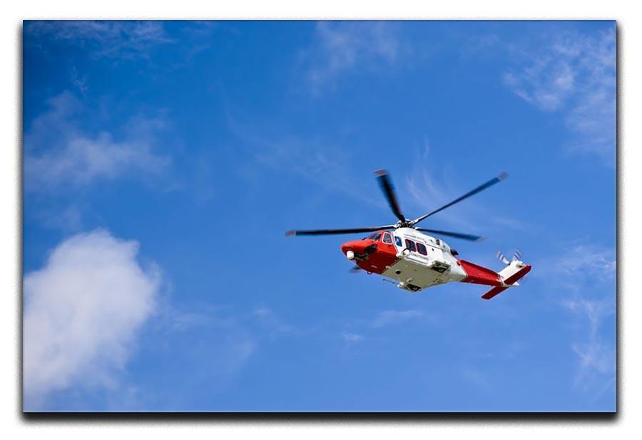 Coastguard helicopter in the blue sky Canvas Print or Poster  - Canvas Art Rocks - 1