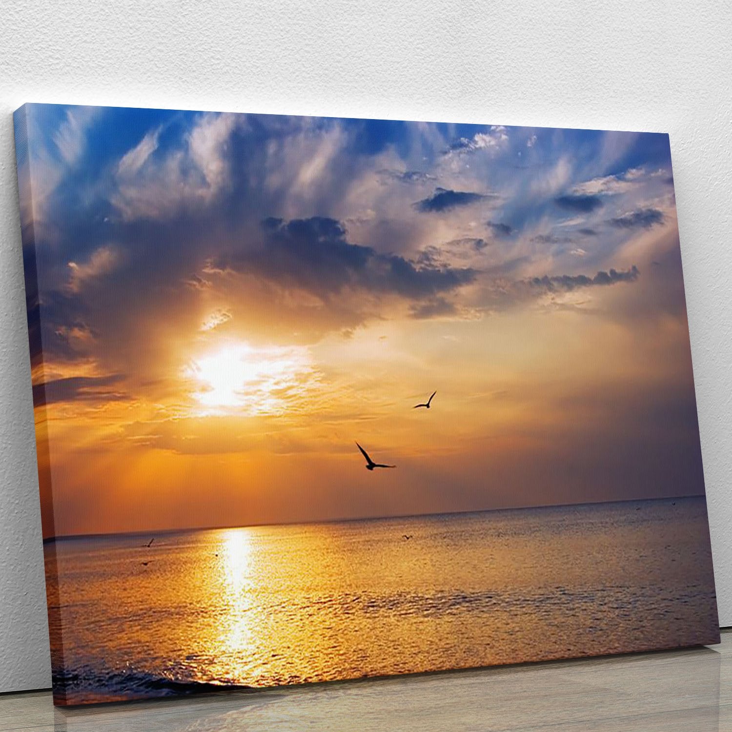 Early morning sunrise over the sea and a birds Canvas Print or Poster