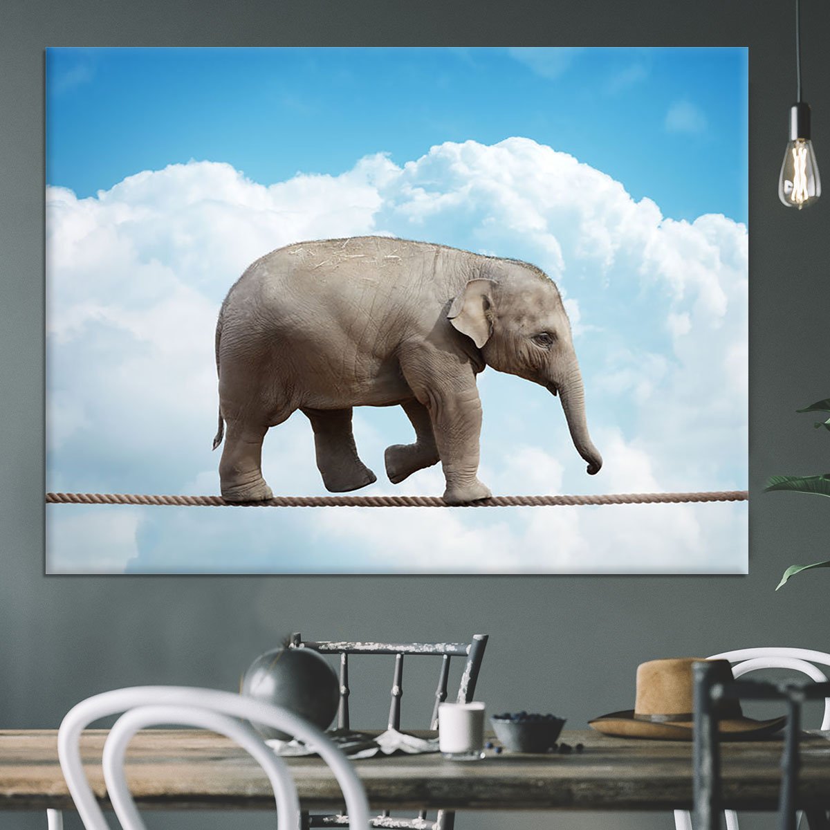 Elehant calf balancing on a tightrope Canvas Print or Poster