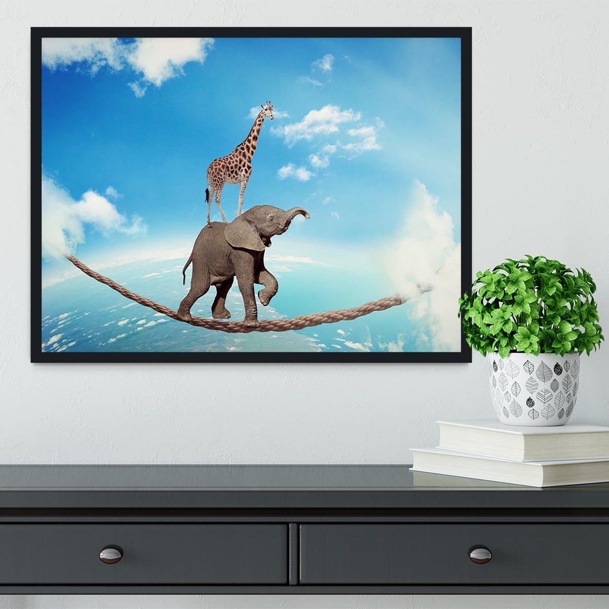 Elephant with giraffe walking on dangerous rope high in sky Framed Print - Canvas Art Rocks - 2