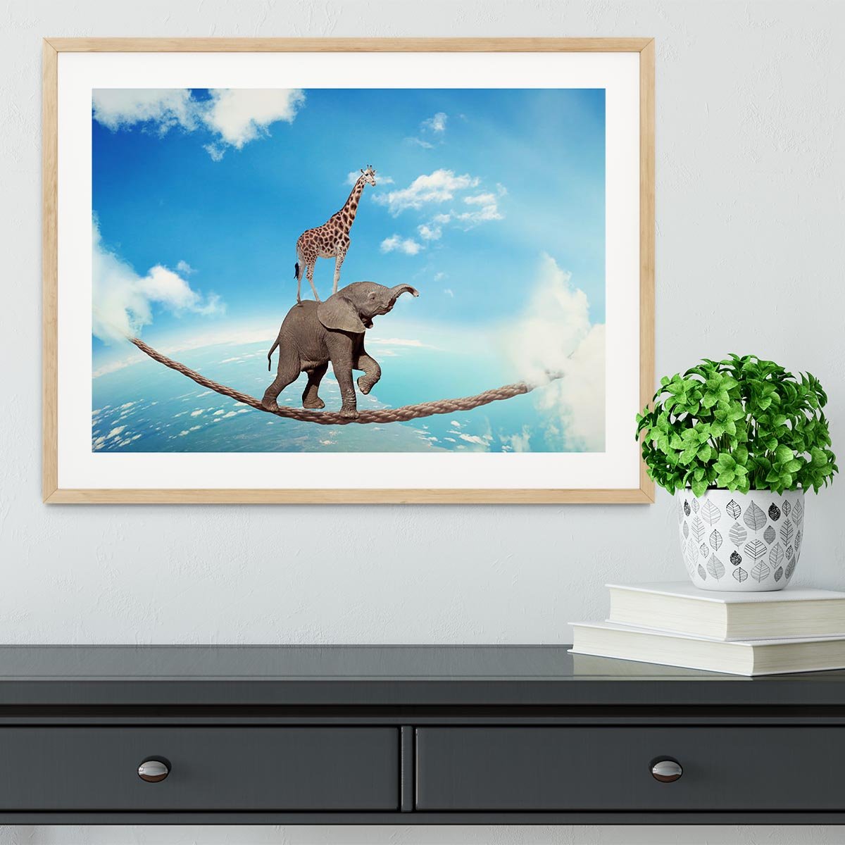 Elephant with giraffe walking on dangerous rope high in sky Framed Print - Canvas Art Rocks - 3