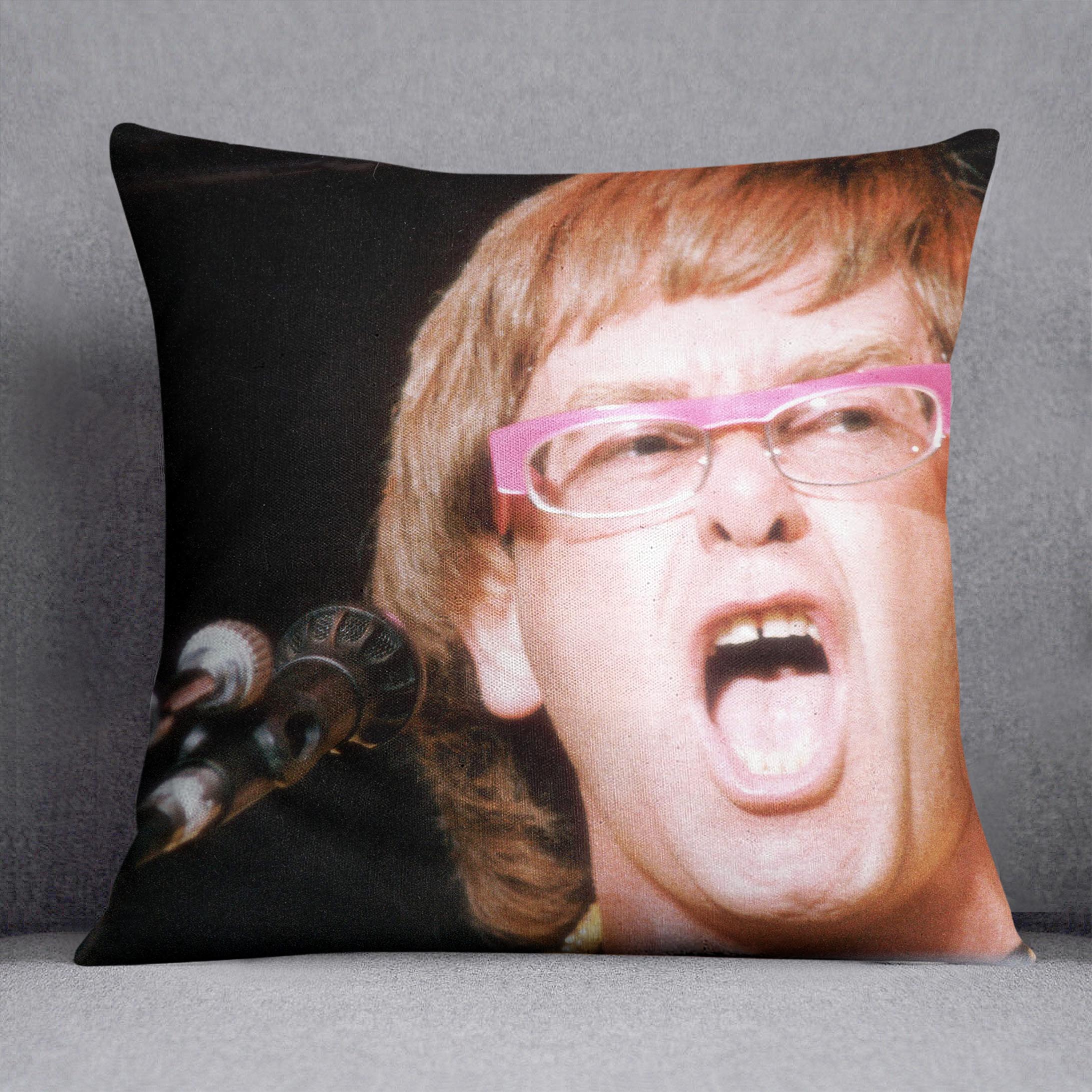 Elton John singing Cushion