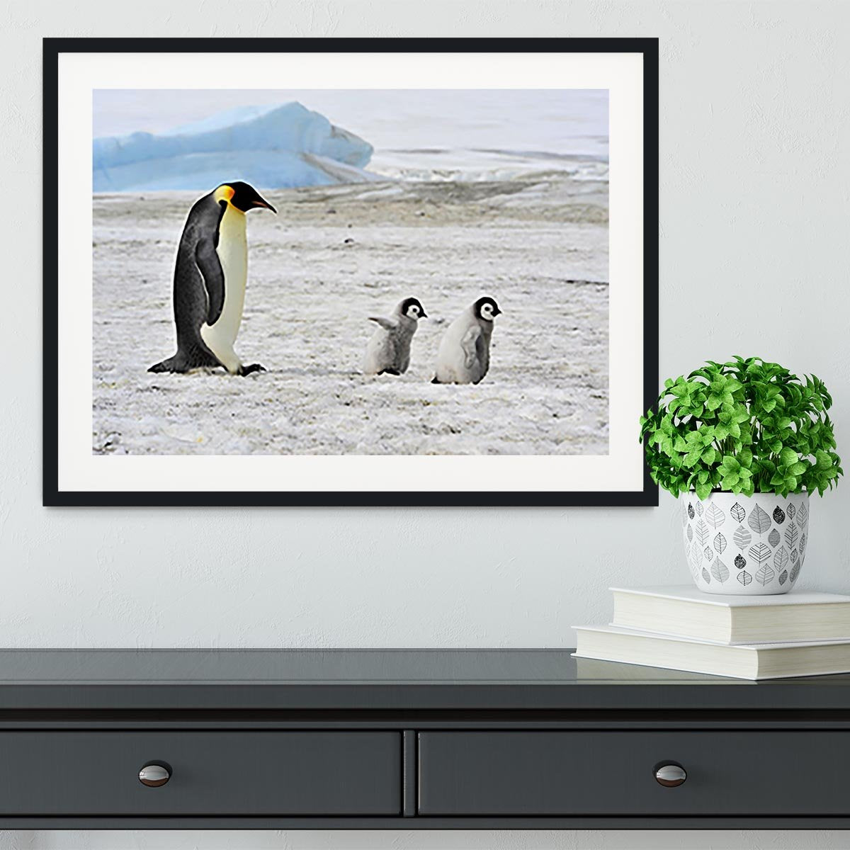 Emperor Penguin with two chicks in Antarctica Framed Print - Canvas Art Rocks - 1