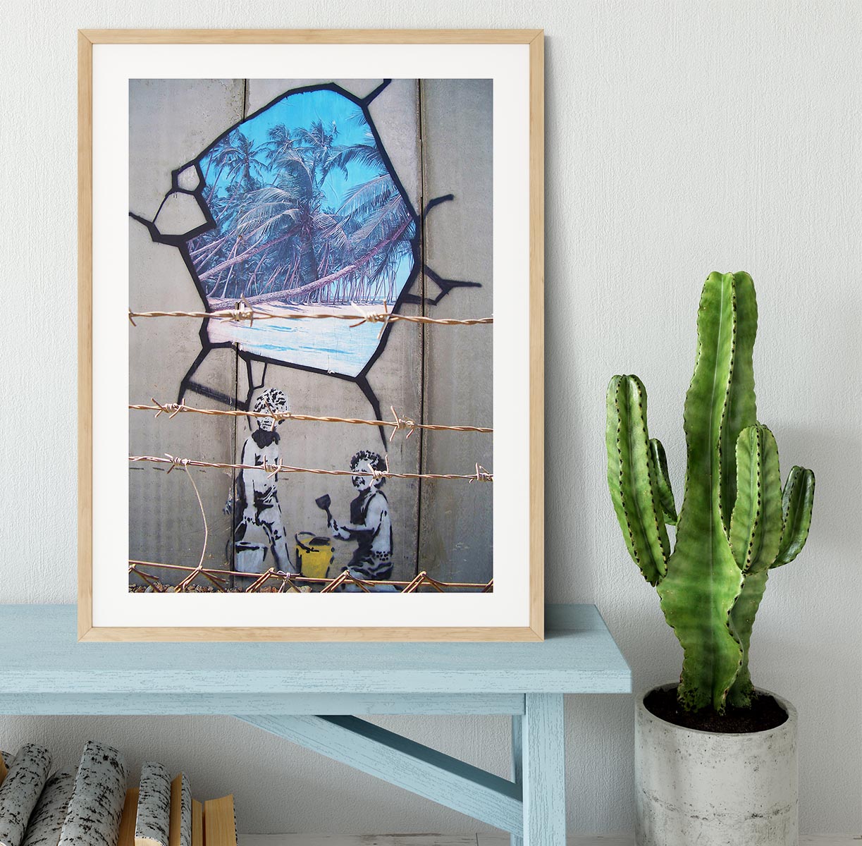 Banksy Finding Paradise Framed Print