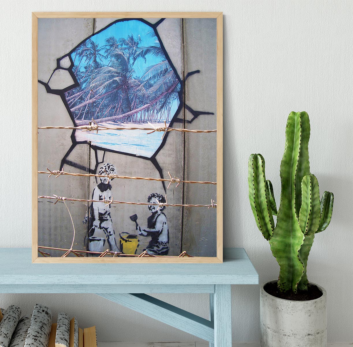 Banksy Finding Paradise Framed Print