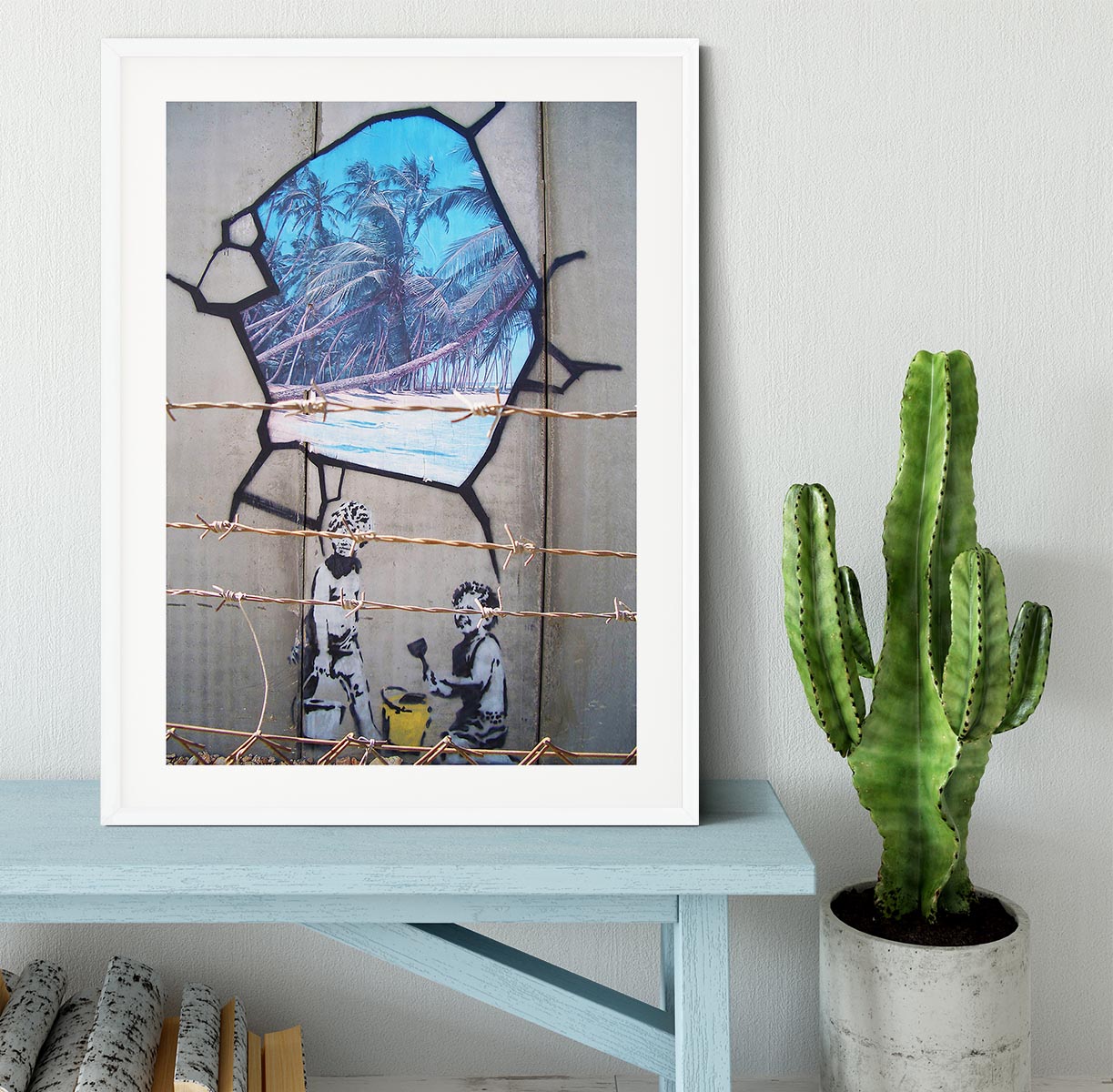 Banksy Finding Paradise Framed Print