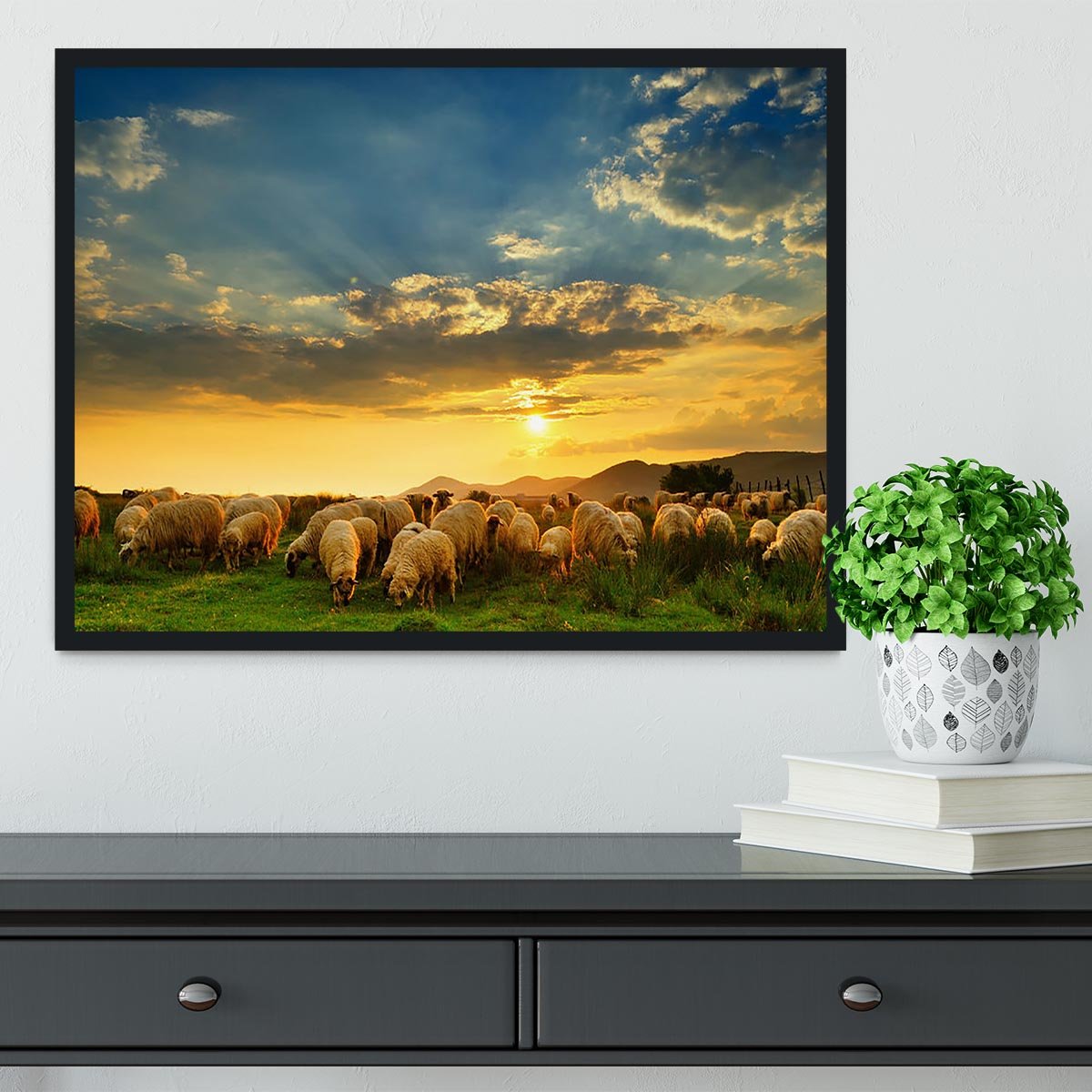Flock of sheep grazing in a hill at sunset Framed Print - Canvas Art Rocks - 2