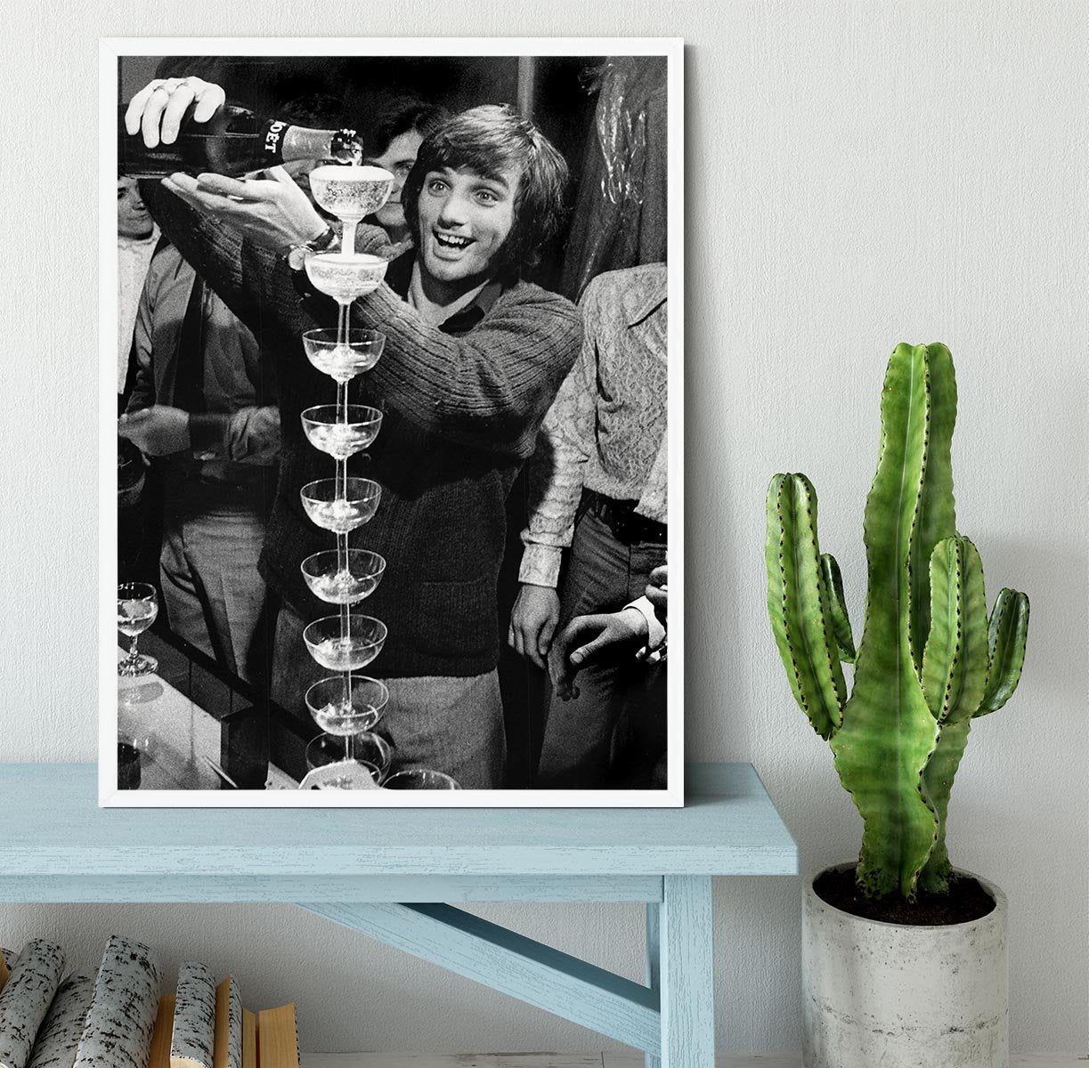 George Best pouring champagne Framed Print - Canvas Art Rocks -6