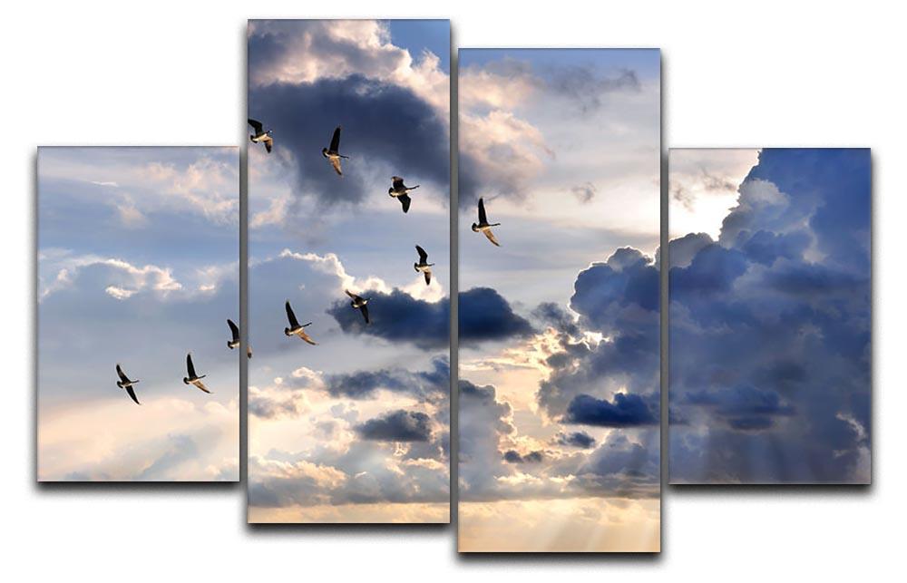 Group of Canadian geese flying in V-formation 4 Split Panel Canvas - Canvas Art Rocks - 1
