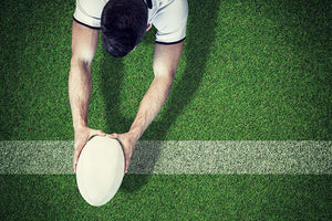 High angle view holding rugby ball Wall Mural Wallpaper - Canvas Art Rocks - 1