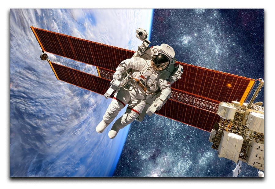 International Space Station and astronaut Canvas Print or Poster  - Canvas Art Rocks - 1
