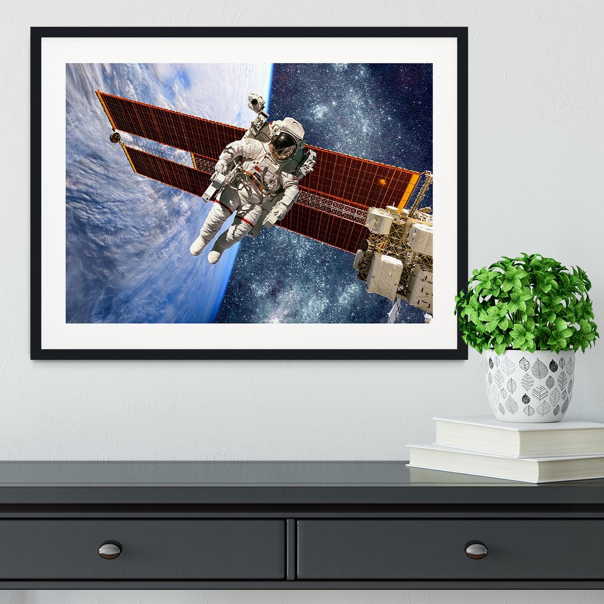 International Space Station and astronaut Framed Print - Canvas Art Rocks - 1