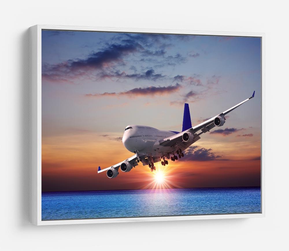 Jet liner over the sea at dusk HD Metal Print
