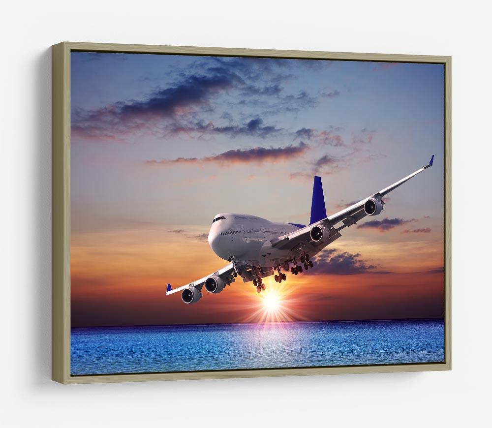 Jet liner over the sea at dusk HD Metal Print
