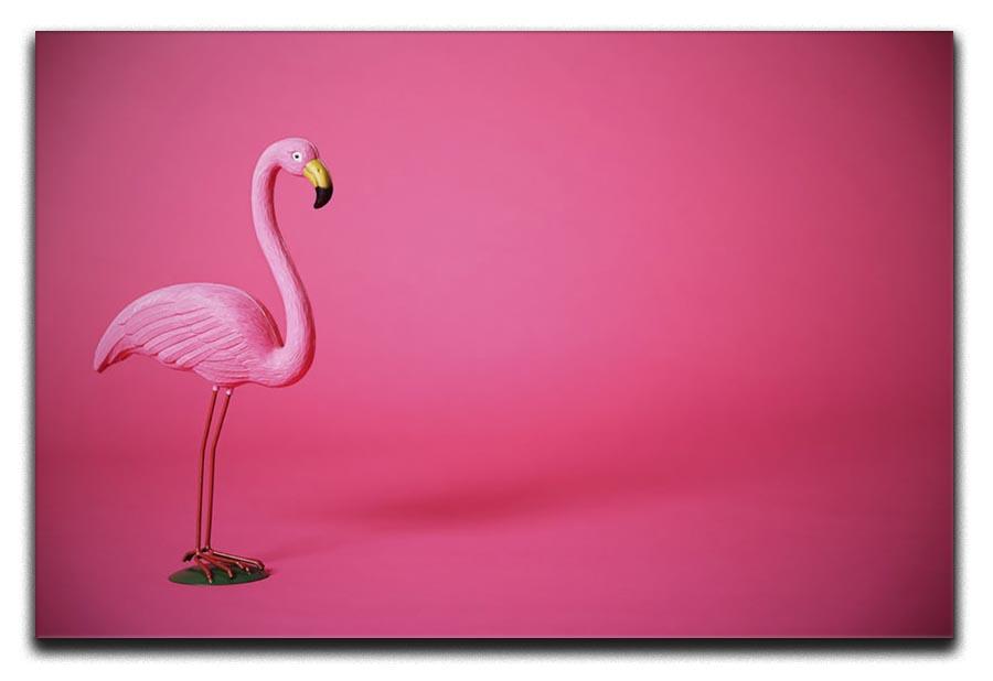 Kitsch pink flamingo in studio Canvas Print or Poster - Canvas Art Rocks - 1