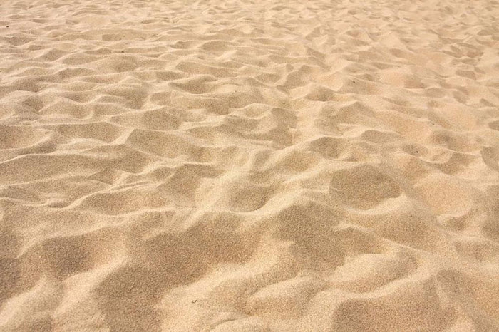 Lines in the sand of a beach Wall Mural Wallpaper