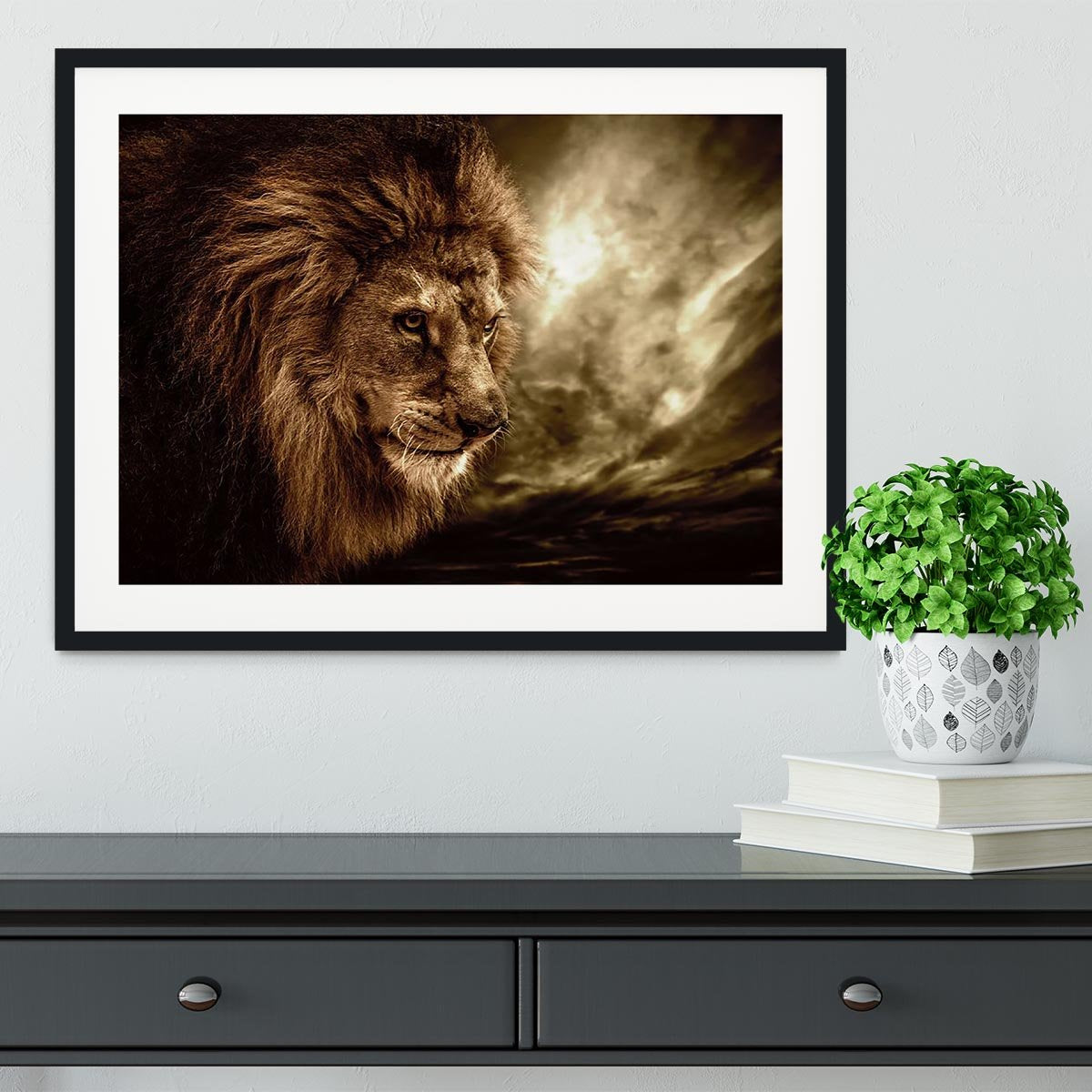 Lion against stormy sky Framed Print - Canvas Art Rocks - 1