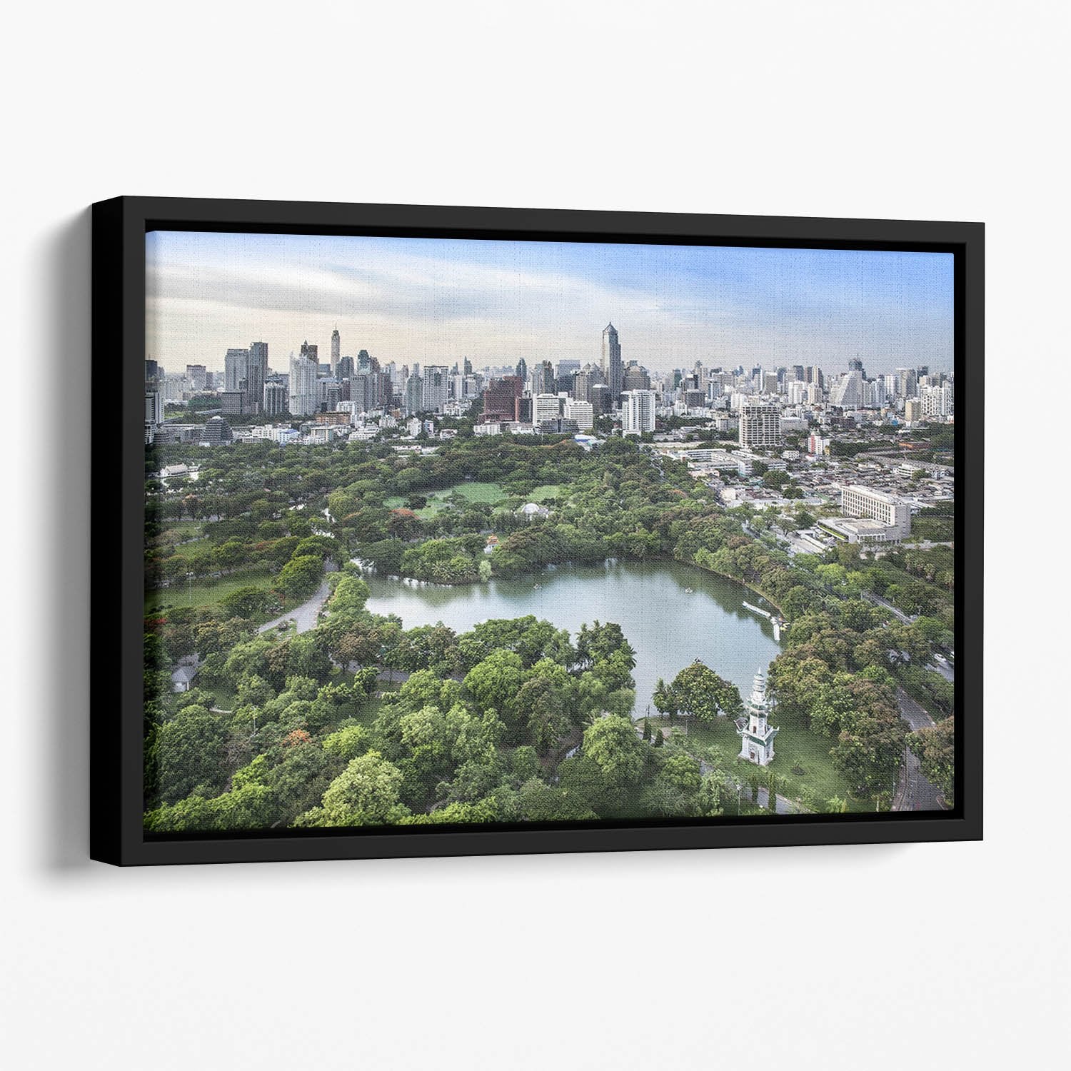 Modern city in a green environment Floating Framed Canvas