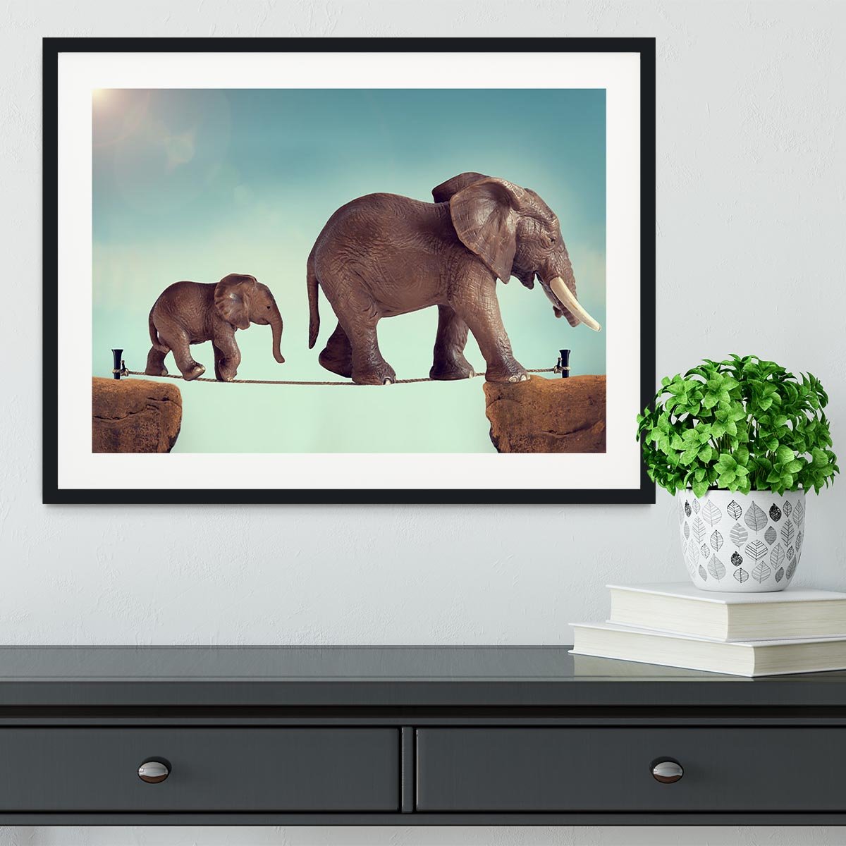 Mother and baby elephant on a tightrope Framed Print - Canvas Art Rocks - 1