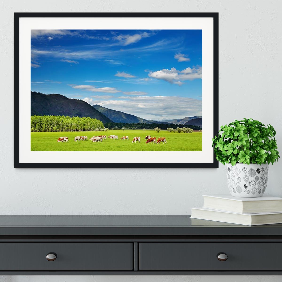 Mountain landscape with grazing cows and blue sky Framed Print - Canvas Art Rocks - 1