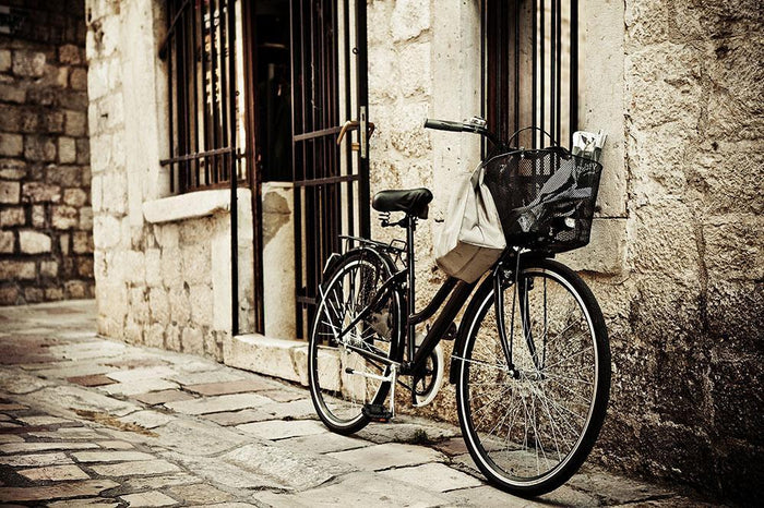 Old bicycle with basket Wall Mural Wallpaper