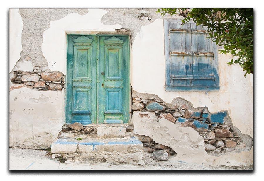 Old wooden door of a shabby demaged house Canvas Print or Poster - Canvas Art Rocks - 1