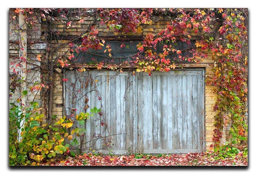 Old wooden door with a brick Canvas Print or Poster - Canvas Art Rocks - 1