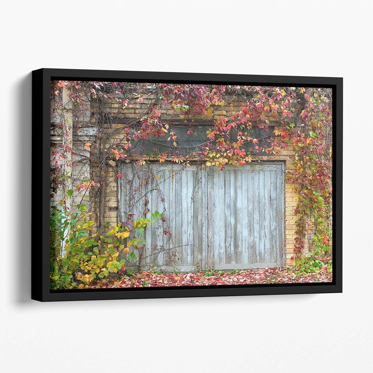 Old wooden door with a brick Floating Framed Canvas