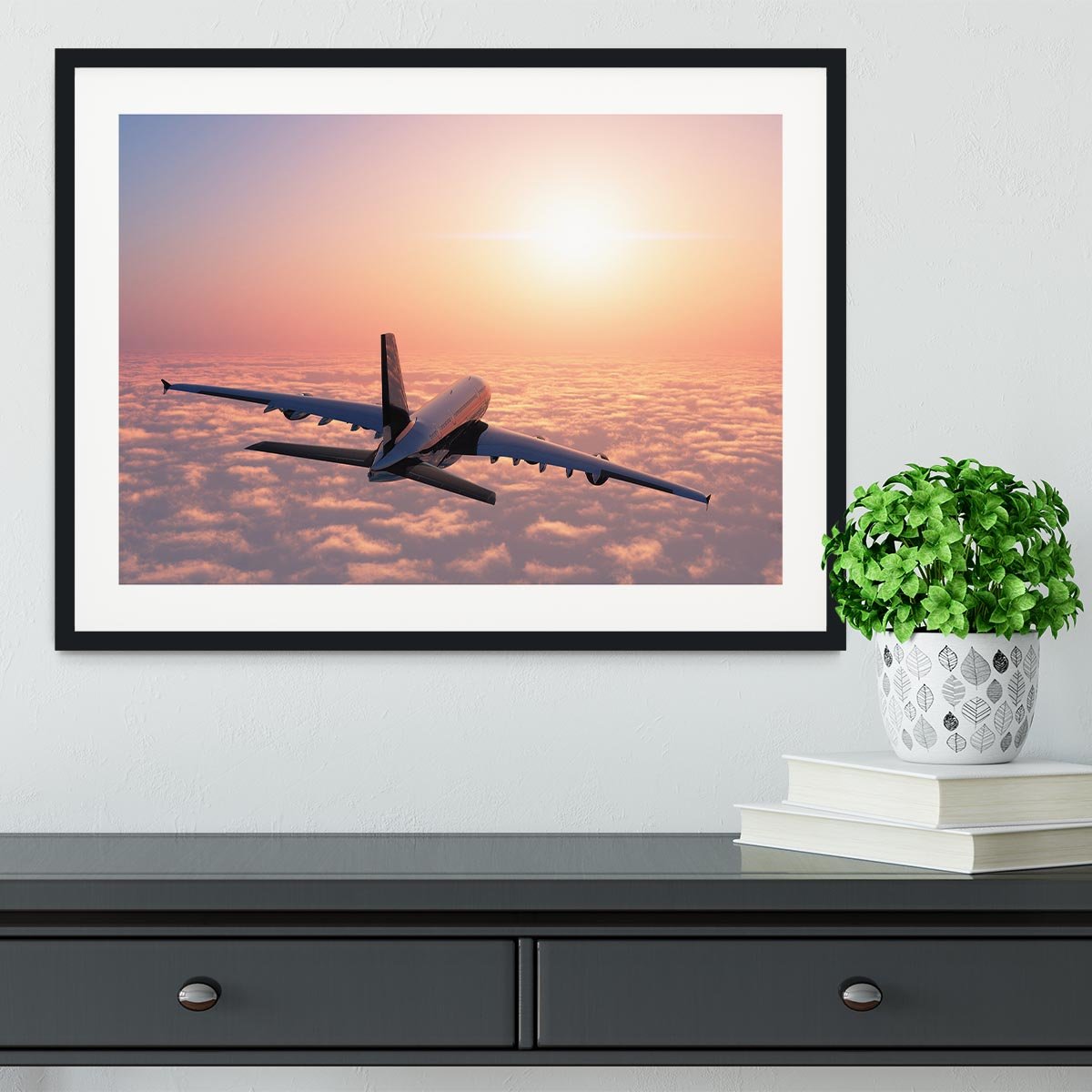 Passenger plane above the clouds Framed Print - Canvas Art Rocks - 1