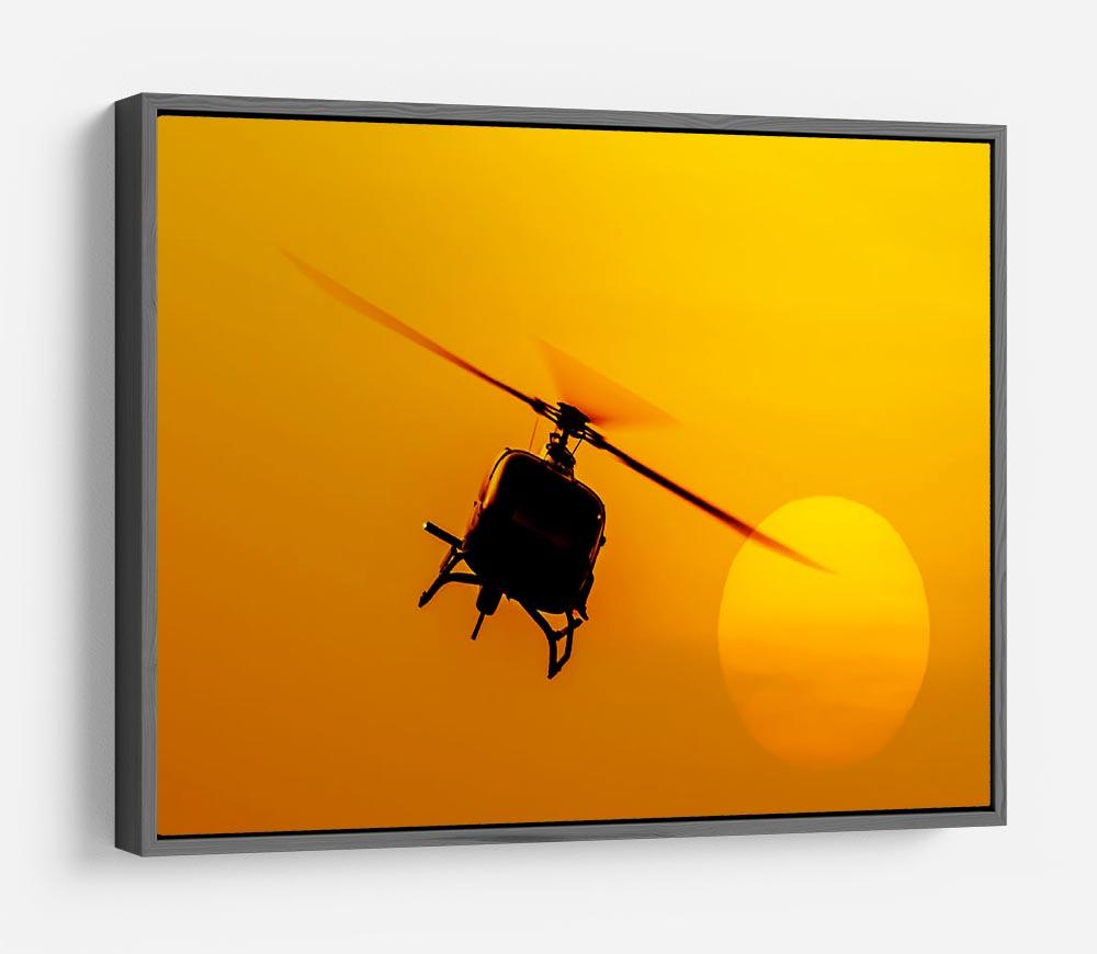 Patrol helicopter flying in sunset HD Metal Print