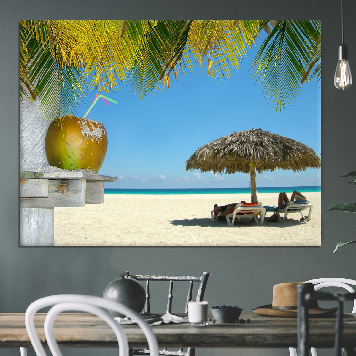 People relaxing under tropical huts with coconut Canvas Print or Poster