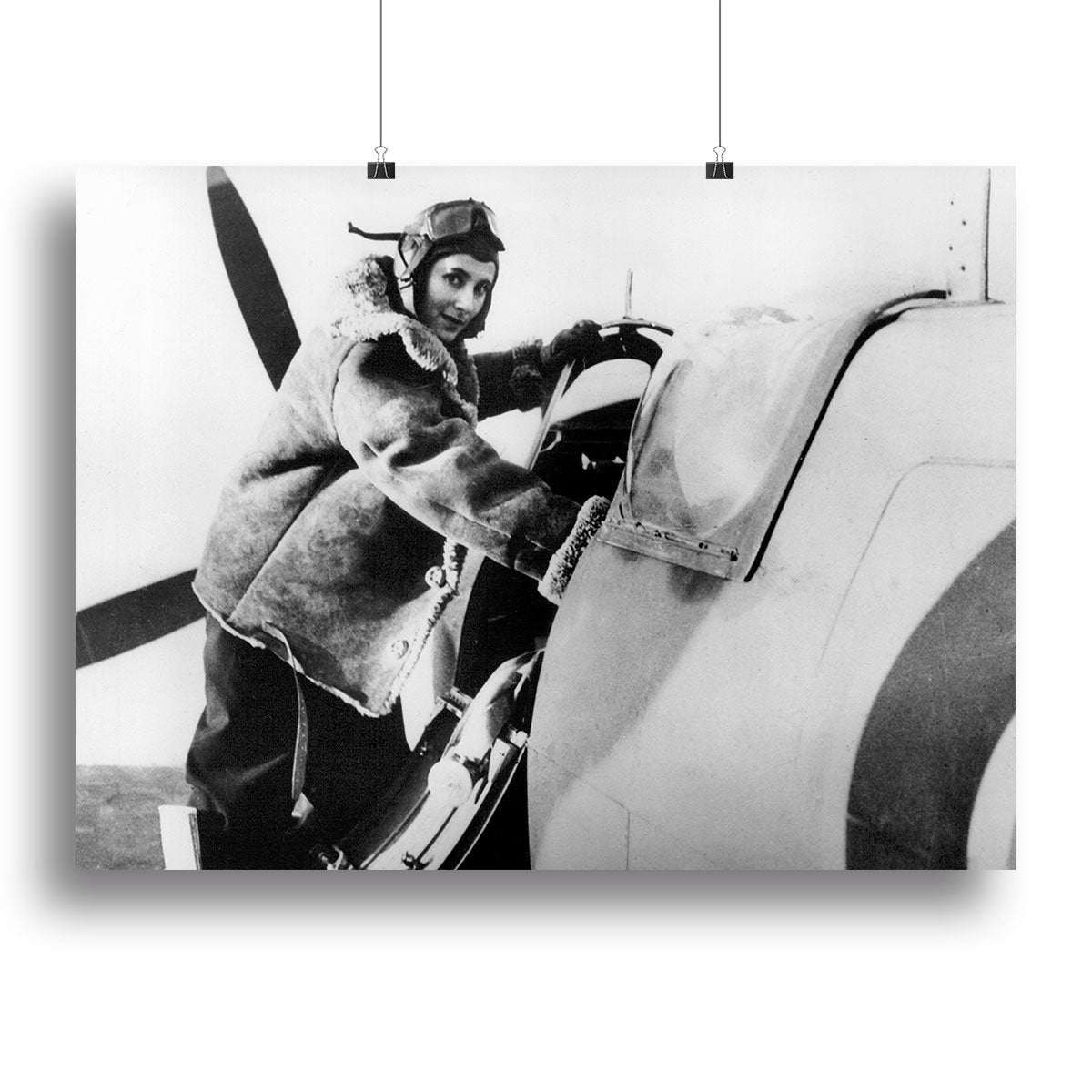 Pilot collecting a Spitfire plane Canvas Print or Poster
