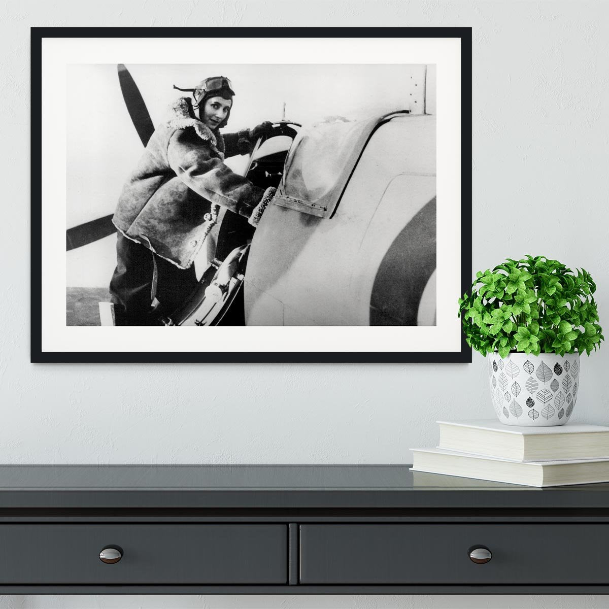 Pilot collecting a Spitfire plane Framed Print - Canvas Art Rocks - 1