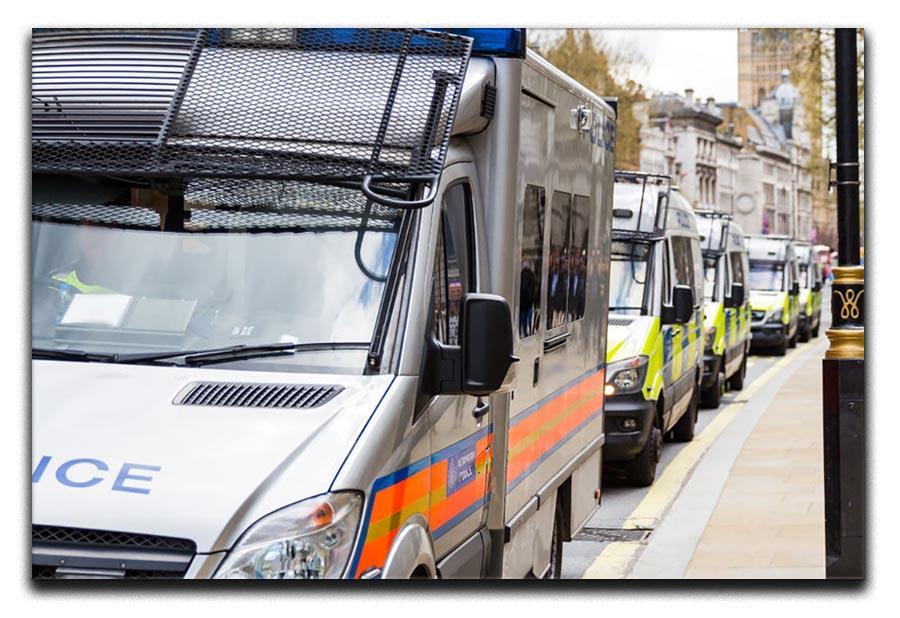 Police vans in a row Canvas Print or Poster  - Canvas Art Rocks - 1