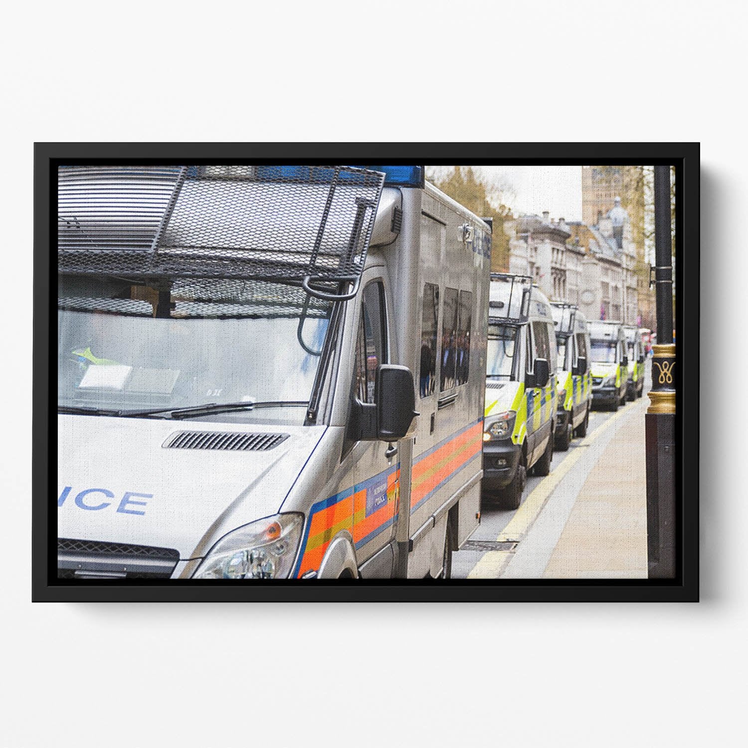 Police vans in a row Floating Framed Canvas