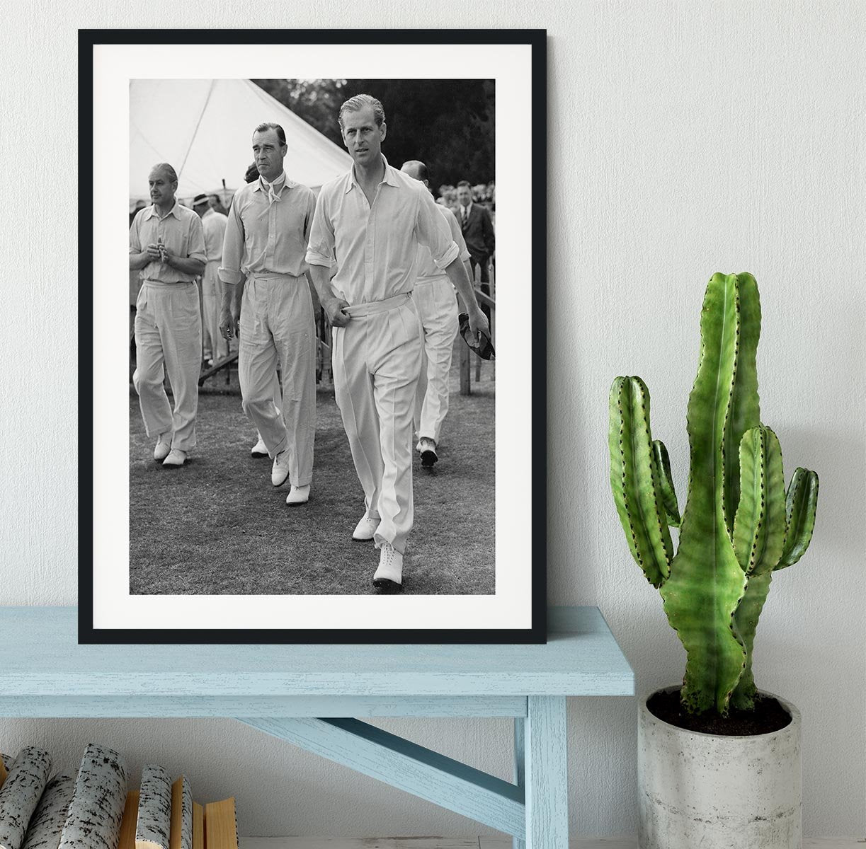 Prince Philip leading his cricket team onto the field Framed Print - Canvas Art Rocks - 1