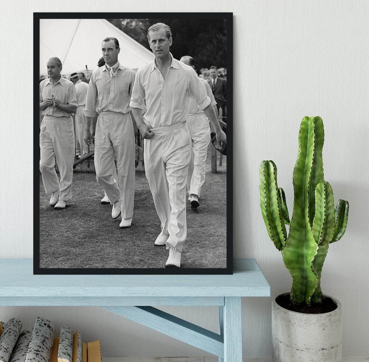 Prince Philip leading his cricket team onto the field Framed Print - Canvas Art Rocks - 2