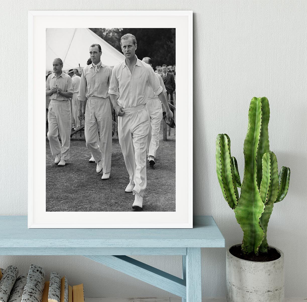 Prince Philip leading his cricket team onto the field Framed Print - Canvas Art Rocks - 5