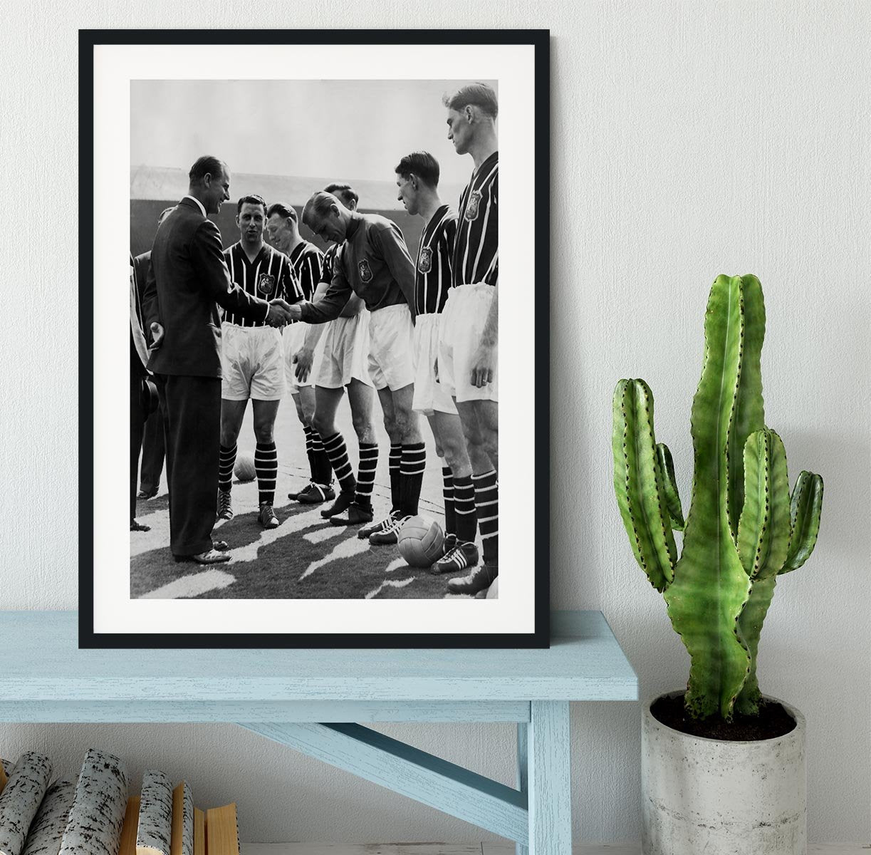 Prince Philip meeting members of Manchester City team Framed Print - Canvas Art Rocks - 1