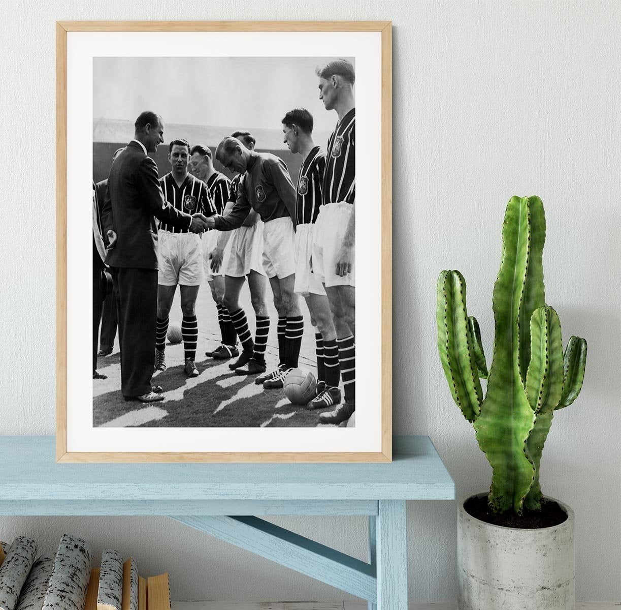 Prince Philip meeting members of Manchester City team Framed Print - Canvas Art Rocks - 3