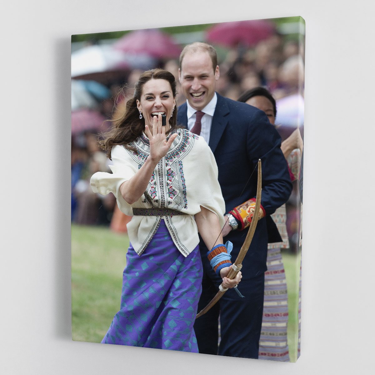 Prince William and Kate laughing trying archery in Bhutan Canvas Print or Poster