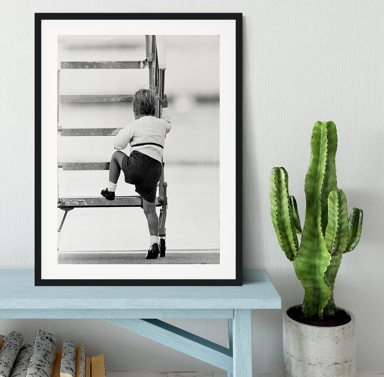Prince William at Aberdeen Airport climbing stairs Framed Print - Canvas Art Rocks - 1