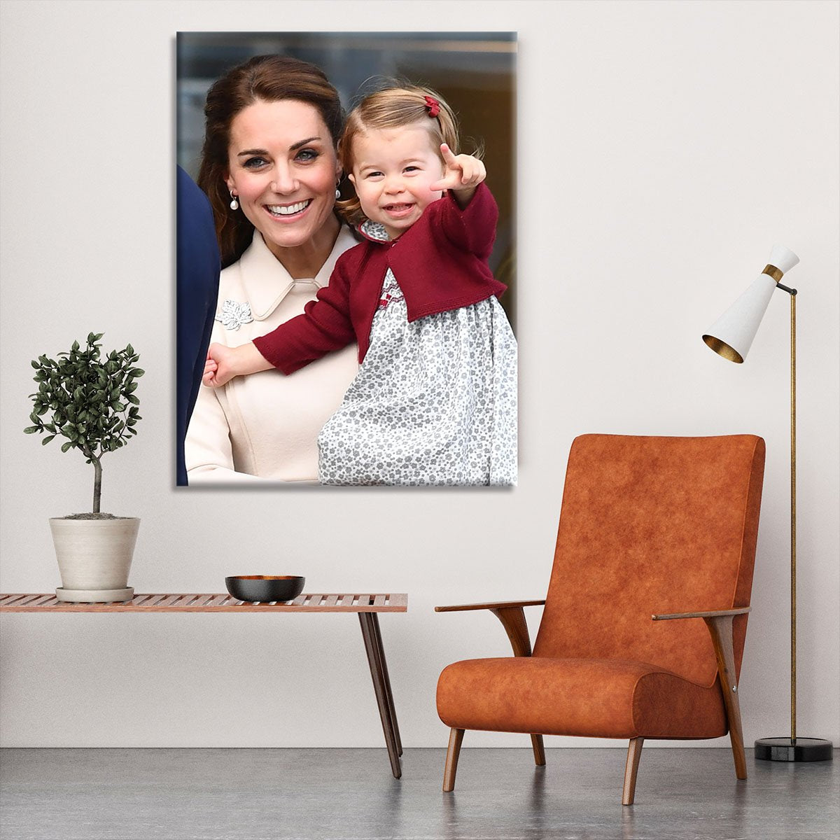 Princess Charlotte held by her mother Kate Canvas Print or Poster