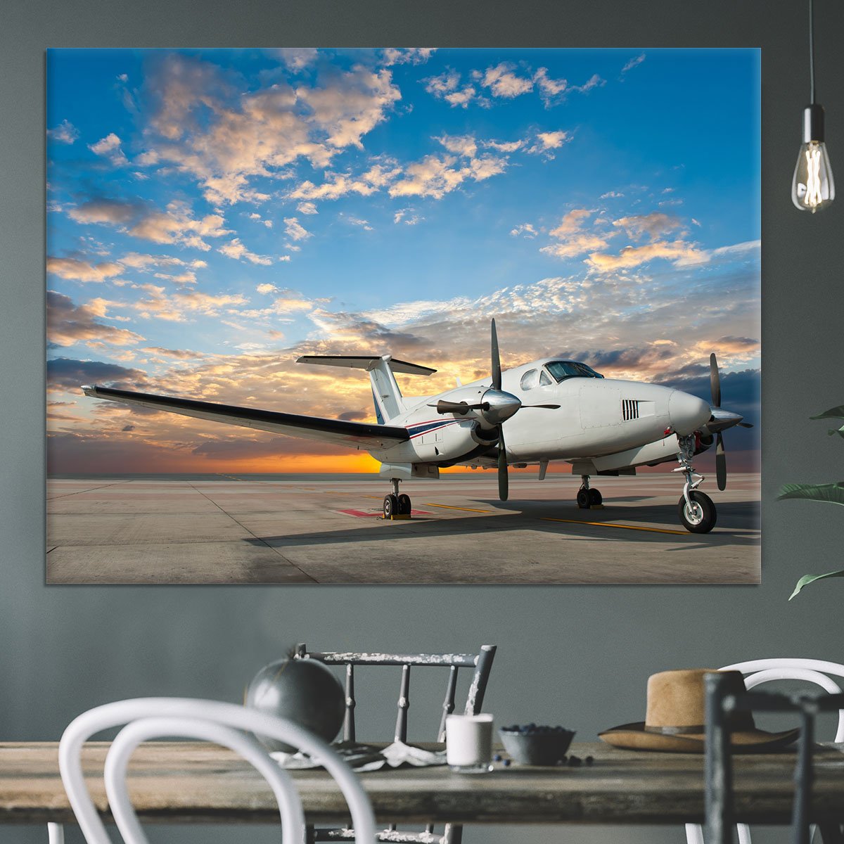 Propeller plane parking at the airport Canvas Print or Poster