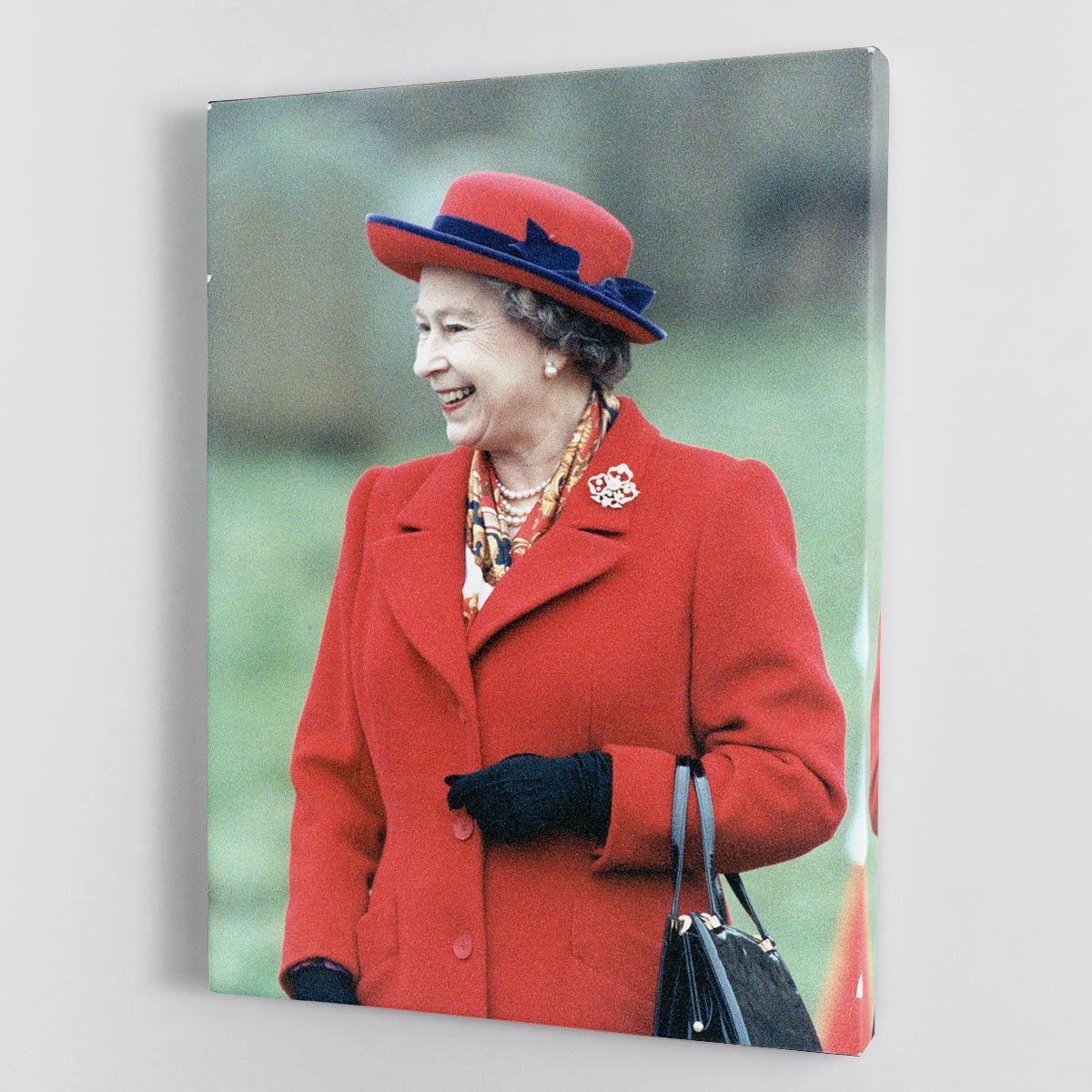 Queen Elizabeth II in a striking red coat at church in Norfolk Canvas Print or Poster