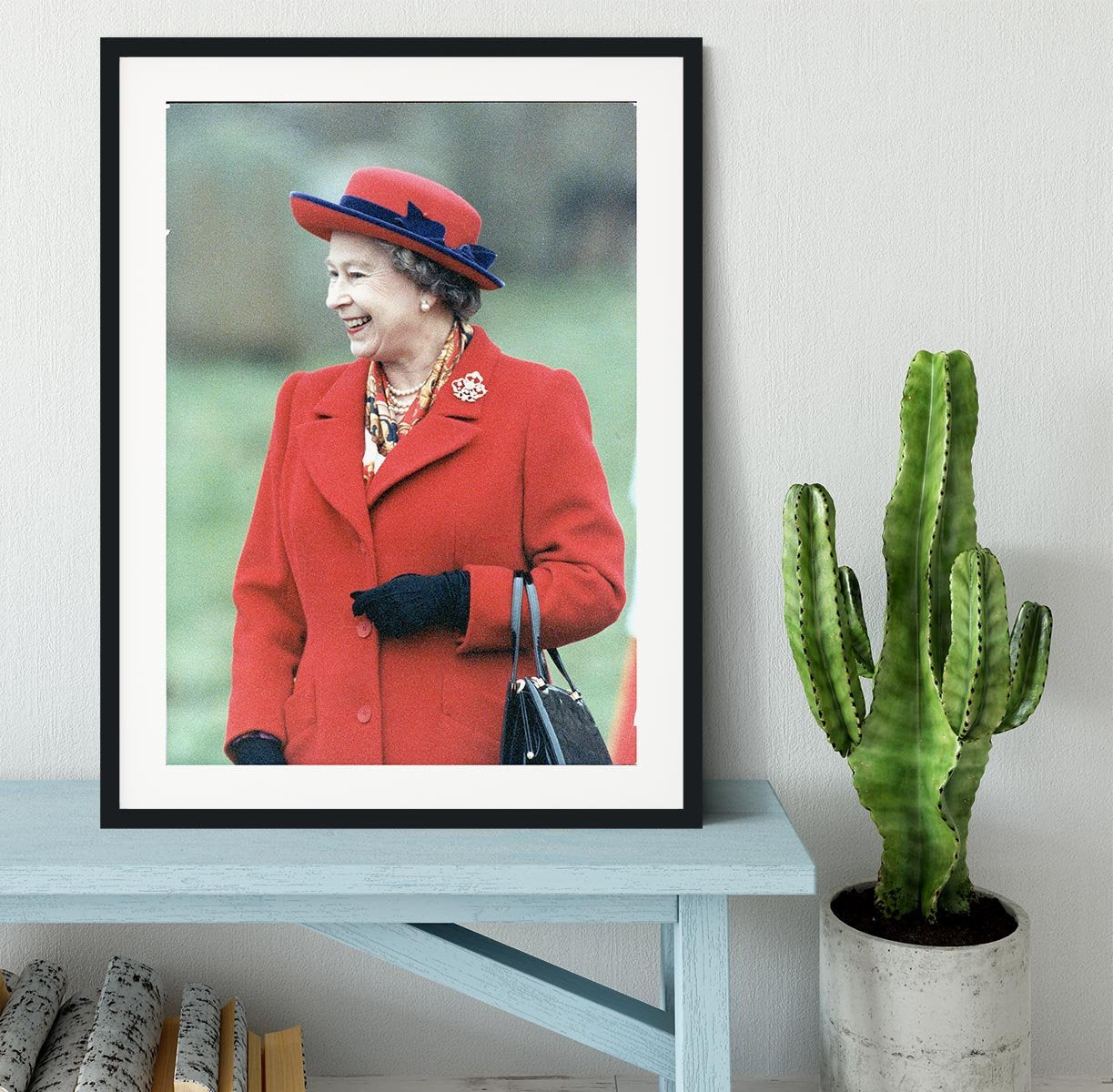 Queen Elizabeth II in a striking red coat at church in Norfolk Framed Print - Canvas Art Rocks - 1