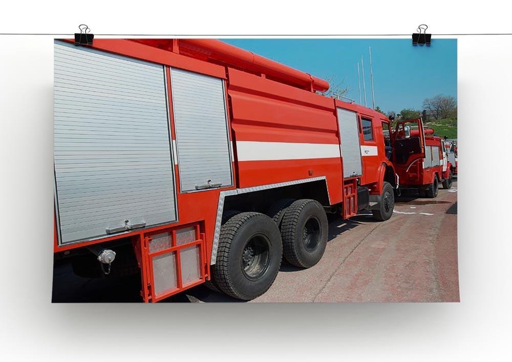 Red fire engine standing on the road Canvas Print or Poster - Canvas Art Rocks - 2