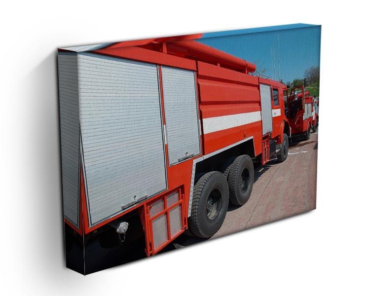 Red fire engine standing on the road Canvas Print or Poster - Canvas Art Rocks - 3