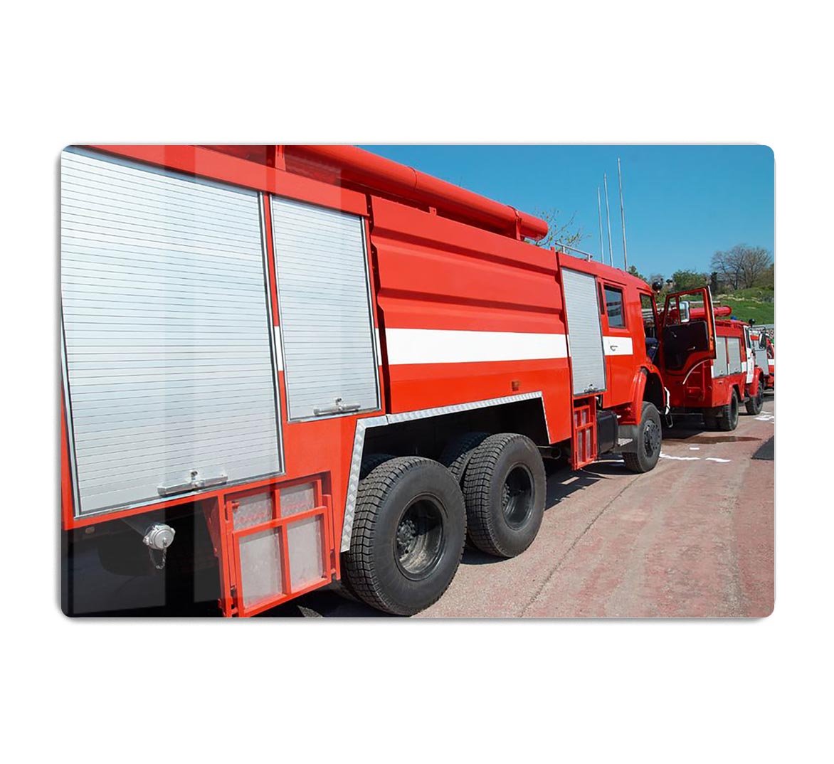 Red fire engine standing on the road HD Metal Print