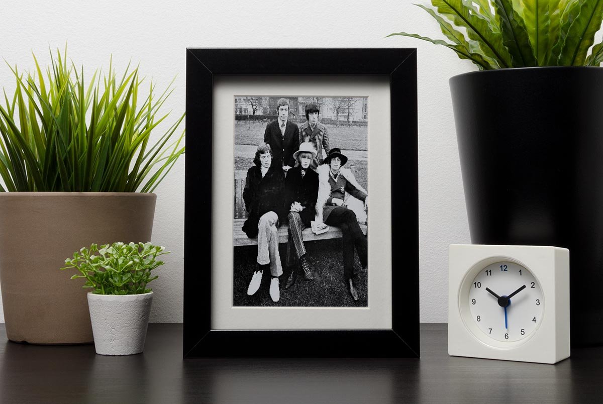 Rolling Stones on a bench Framed Print - Canvas Art Rocks - 1